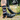 Person wearing Pabst branded socks with a bike in the background