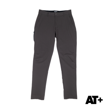 A pair of dark gray slim-fit cargo pants shown flat against a white background, featuring zippered side pockets and a button fly. An 'AT+' brand logo is visible in the bottom right corner.