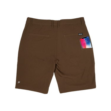 Brown shorts with a brand label on a white background
