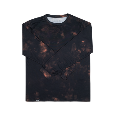 A long-sleeve athletic shirt, featuring a dark black base with a copper-brown and orange tie-dye pattern, laid flat against a white background.