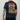 A man wearing a dark navy blue tie-dye t-shirt, viewed from the back. The shirt features a large, colorful graphic print with the text 'PABST ALL RIBBON' in red and white, and 'BYRE CLUB' in red at the bottom, surrounded by a detailed psychedelic illustration.