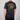 Black t-shirt with yellow graphic and text on the back, worn by a person against a plain background