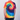 Person wearing a vibrant tie-dye t-shirt with a white background
