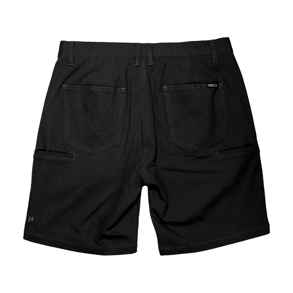 Black shorts with multiple pockets on a white background