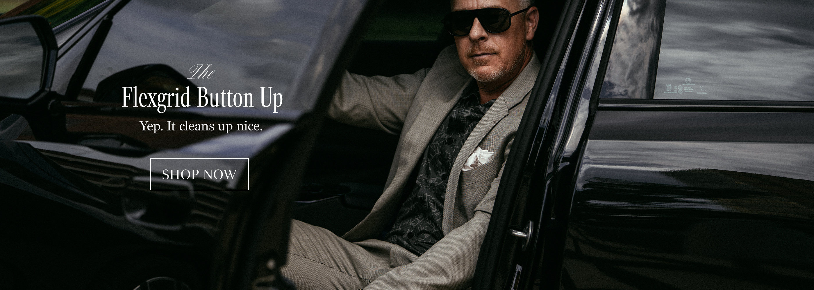Man sitting in a car with promotional text for Flexgrid Button Up.