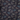 close up of a dinosaur and UFO pattern on dark blue fabric