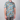 Person wearing a colorful floral shirt with a neutral background
