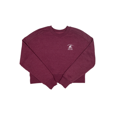 Maroon sweatshirt with a small white logo on a white background