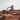 Person riding a mountain bike on a dirt trail with text overlay