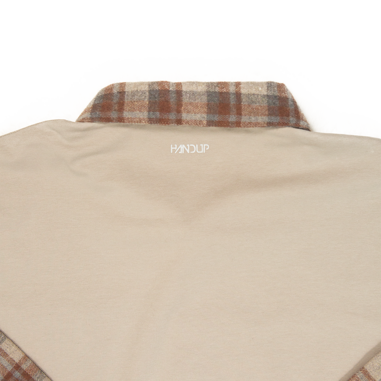 Beige shirt with plaid collar on a white background, featuring the brand 'HANUP'.
