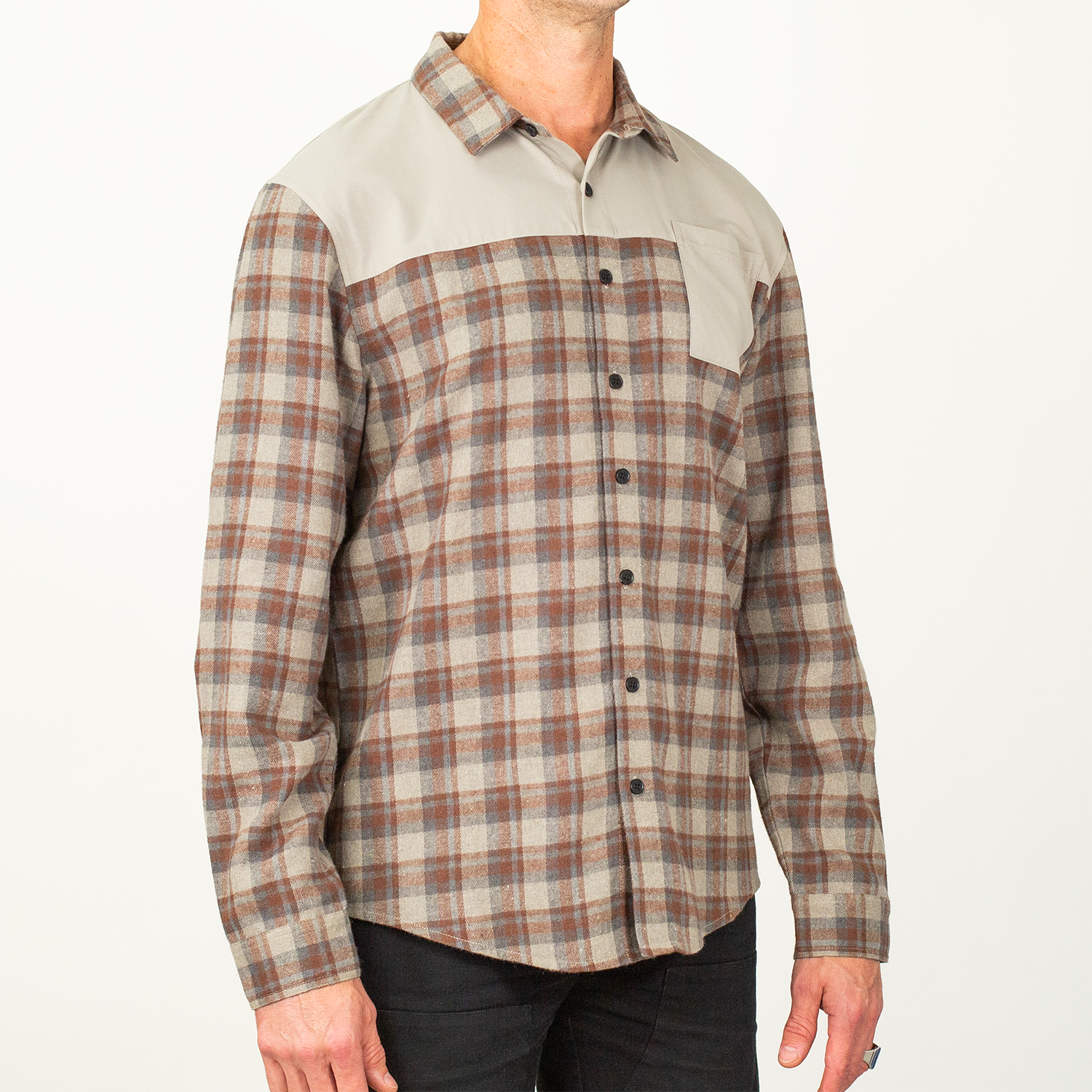 Plaid shirt with a mix of brown, beige, and white patterns on a white background