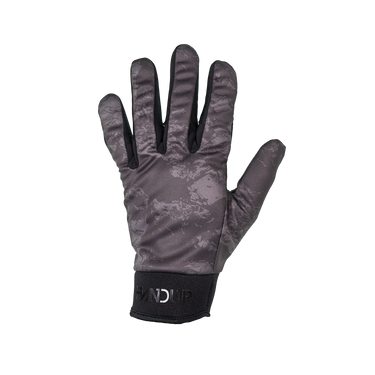 A single dark gray and black camouflage winter glove shown flat against a solid white background, featuring a black wrist strap with a debossed brand logo.