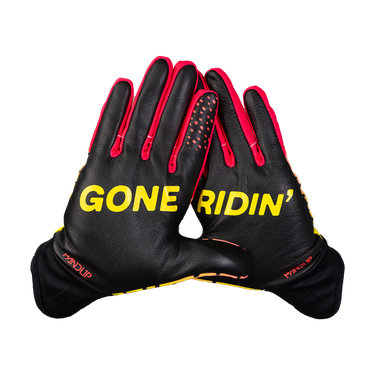 A pair of black leather motorcycle gloves with bright red trim and yellow branding text reading 'GONE RIDIN'' on the backs, displayed against a solid white background.