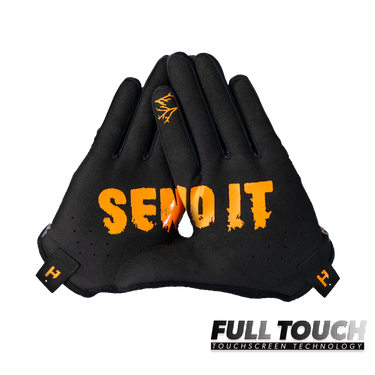Black glove with orange text 'SEND IT' on a white background