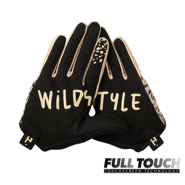 Black gloves with 'Wildstyle' text and touchscreen technology label on a white background