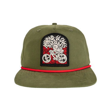 Green cap with a motorcycle patch and red band on a white background