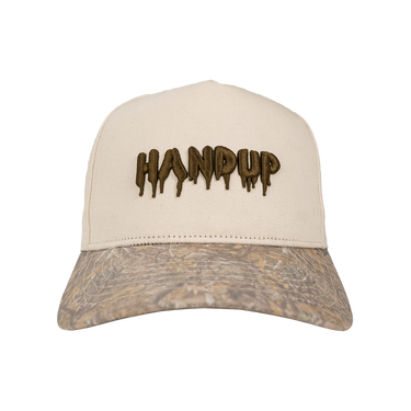 Beige and camouflage cap with 'HANDUP' embroidery on a white background