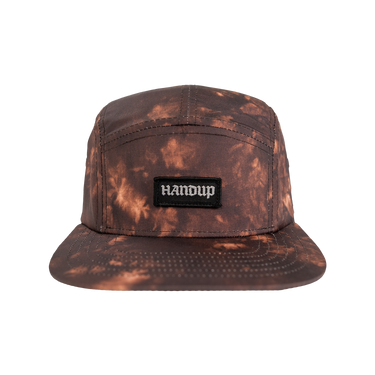 Brown tie-dye cap with a logo on a white background