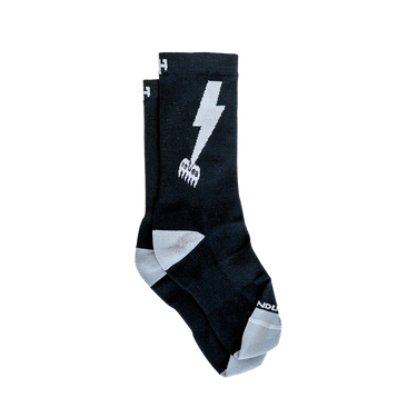 Black socks with a white lightning bolt design on a white background