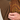 Close-up of a person's hand unzipping a brown athletic jacket with a distinctive orange topographic contour line pattern on the inner side.