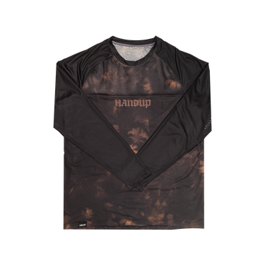 long sleeve mountain bike jersey with a black and tan tie dye design and 'HANDUP' logo