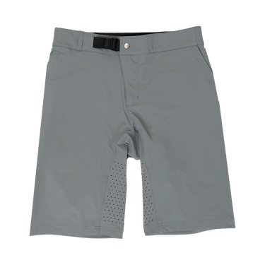 A pair of trail rambler mountain bike shorts in steel grey color with a stretch waistband, multiple pockets, and a self-locking buckle.