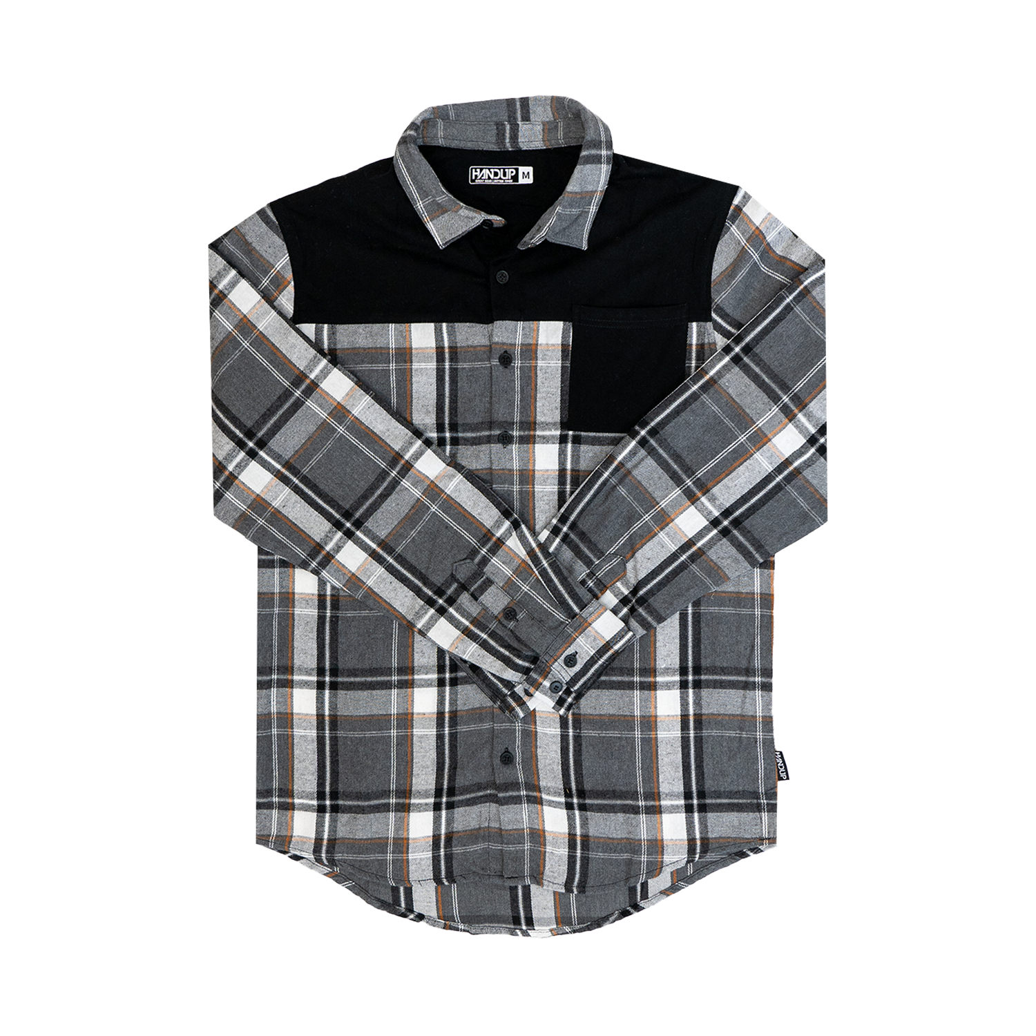 A long-sleeved Flannel Button Up shirt with a checkered pattern in black, gray, and white, featuring a solid black panel across the top shoulders.