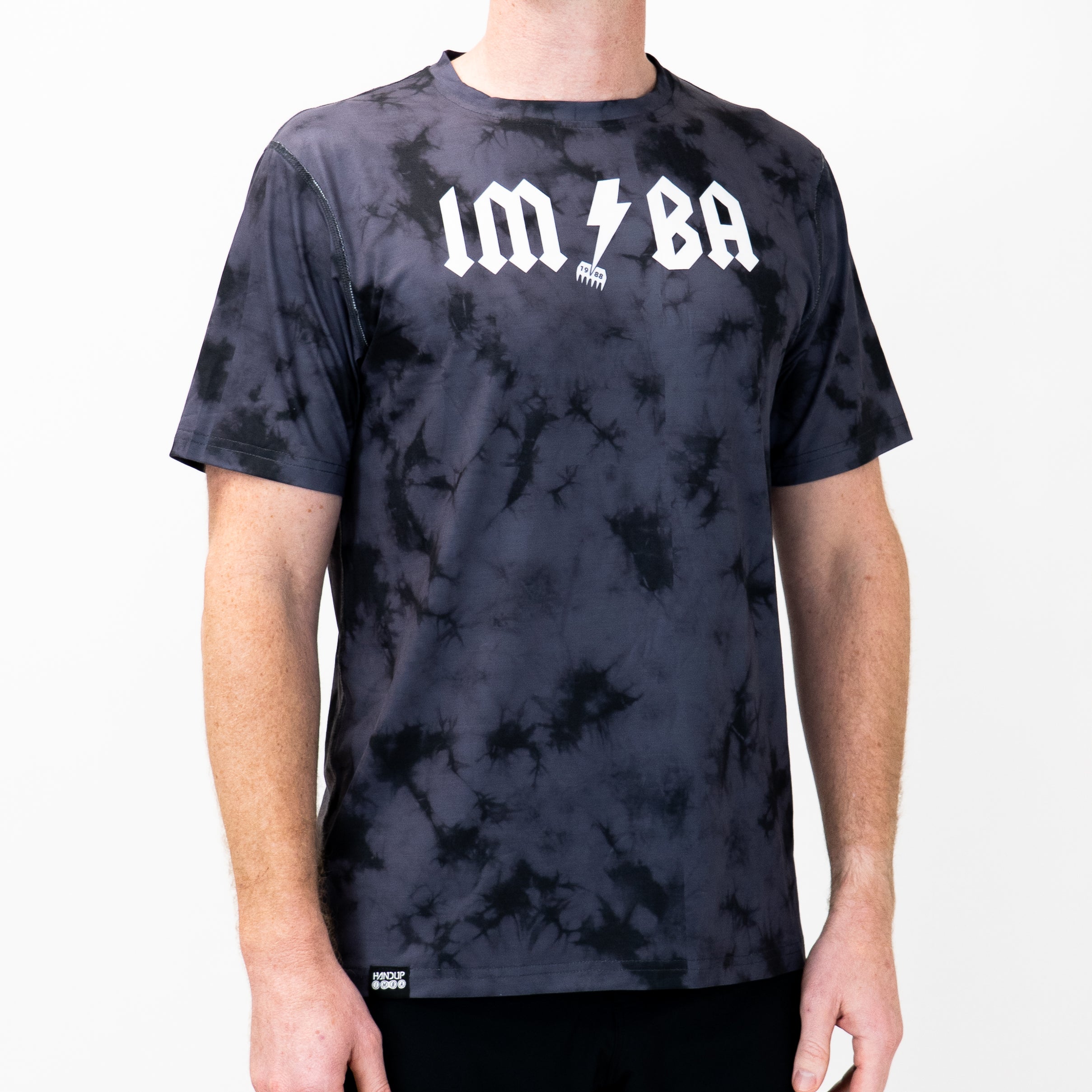 black and gray tie-dye tech shirt with IMBA logo
