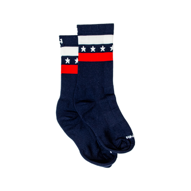 A pair of socks with a patriotic design featuring red, white, and blue colors and stars.