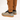 Close-up of brown pants with a logo and gray shoes on a white background