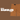 Brown shorts with 'Trail Rambler Shorts' text on a brown background