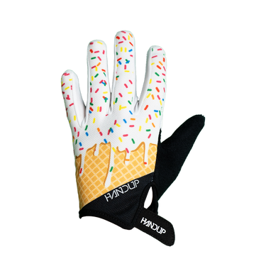 A pair of youth gloves with a colorful ice cream cone design and sprinkles, predominantly yellow and white, with black accents.