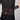 Person wearing black athletic gear with visible branding on a plain background