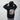 Black hoodie with a graphic design on the back, worn by a person against a plain background