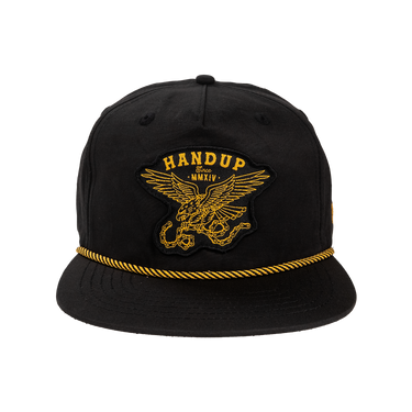 Black cap with gold embroidered design and 'HANDUP' text on a white background