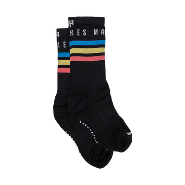 Black socks with colorful stripes on a white background