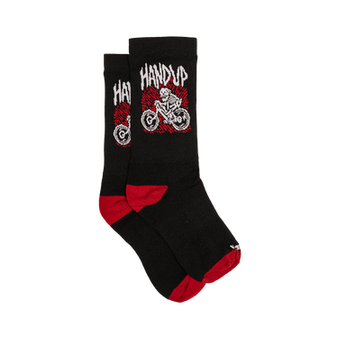 Black socks with red accents and graphic designs on a white background