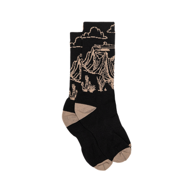 Black sock with beige mountain design on a white background