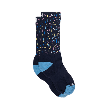 Pair of dark blue socks with colorful pattern and light blue accents on a white background