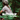person laying in a camp chair with gloves on, with text overlayed that advertises 'button ups with flexgrid'