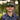 Man wearing a black cap with 'IMBA' logo outdoors