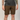 Person wearing brown shorts and a black t-shirt on a plain background