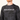 Person wearing a black long-sleeve shirt with 'HANDUP' printed on it against a plain background