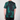 Green tie-dye t-shirt worn by a person on a plain background