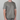 Person wearing a green t-shirt with 'HANDUP' branding on a gray background