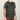 Person wearing a dark green t-shirt with a logo on a plain background
