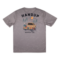 Gray t-shirt with a graphic design on the back featuring a truck and trees, with 'Handup Supply Co.' text.