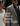 Man and woman walking together with text 'From Trail to Tavern Date Night' overlayed.