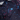 Close-up of a dark shirt with colorful speckles and a logo on a white background