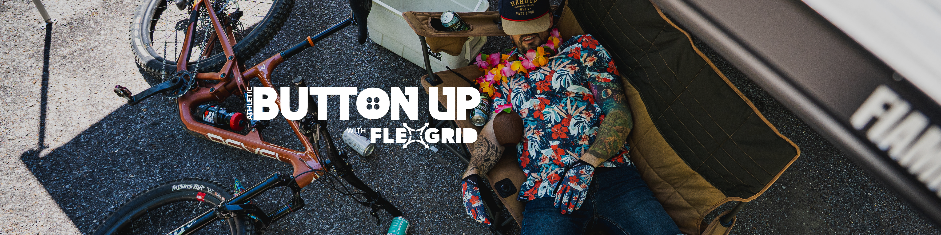 person laying in a camp chair with gloves on, with text overlayed that advertises 'button ups with flexgrid'